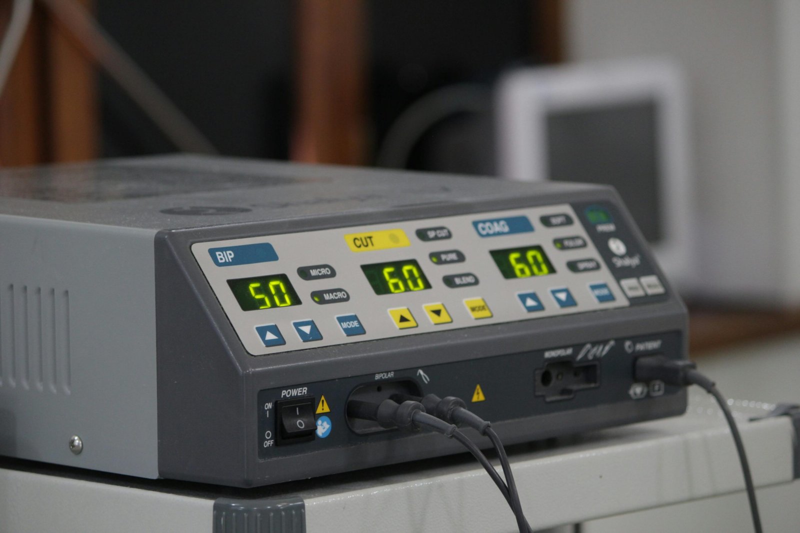 A close-up view of a medical electrosurgical generator used in surgical procedures.